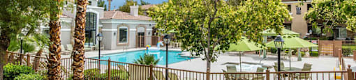 Pool near landscape at THE CLUBS AT RHODES RANCH APARTMENT HOMES, Las Vegas