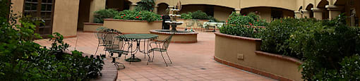 Courtyard with seating at KLIMPEL MANOR Apartments, California, 92832