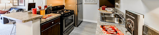Full kitchen view at CASA GRANDE APARTMENT HOMES, California