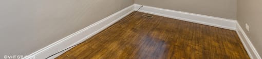 Bright bedroom with hardwood floors