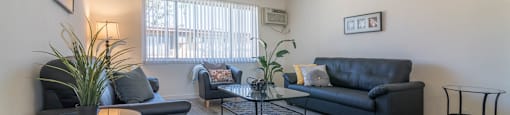 living room view at Serrano Apartments, West Covina, CA