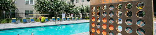 poolside games like connect 4 at Glenwood Park Lofts, Georgia, 30316