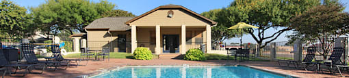 Pool and lounge chairs at GEORGETOWN PARK, Texas