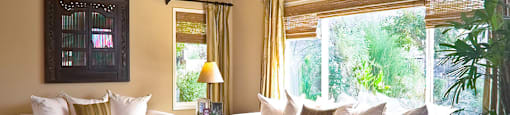 a living room with couches and a coffee table