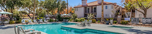 the swimming pool at the enclave apartments