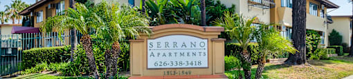 building entrance signage at Serrano Apartments, West Covina, 91790
