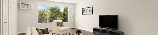 a living room with a couch and a tv