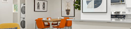 Valley Village Apartments - Kling Trio - Living Room With Modern Furniture and Dining Room Table