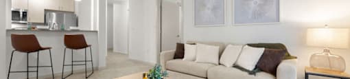a living room with a couch and a table