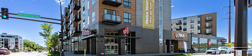 A street view of a building with the word "LOWA" on it.