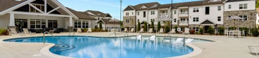 Apartments for Rent Ashland City, TN - Ashland Farms - Resort-Style Pool with Sundeck and Lounge Seating.