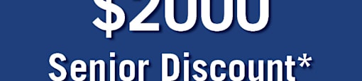 A blue advertisement for a $2000 senior discount from Realstar.