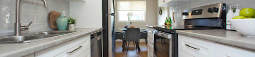 High Street Apartments Kitchen featuring stainless steal appliances in Fort Erie, Ontario