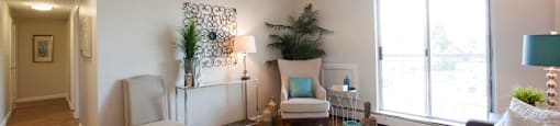 Linden Court large living room with access to balcony in St. Catharines, ON