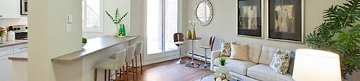 Whitby Place in Whitby, ON open concept living room and kitchen with breakfast bar