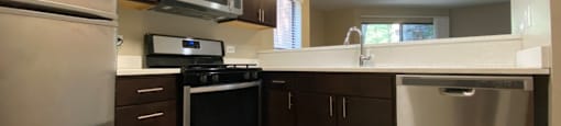 Upgraded kitchen with rich wood cabinetry