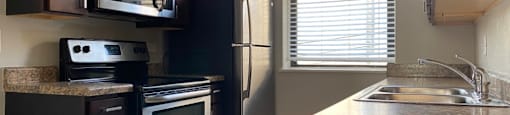 Bright kitchen with stainless steel appliances