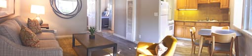 View from living area into kitchen and bedroom
