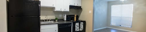 View of kitchen at Rolling Brook with wood look flooring, black appliances, dark counters, white cabinets, recessed lighting, and well lit window in living area
