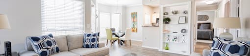 a living room with couches and a coffee table