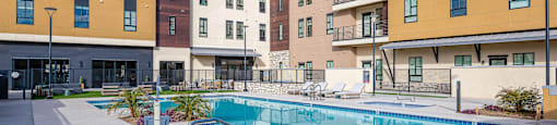 Swimming Pool And Sundeck at Solace at Ballpark Village, Goodyear, AZ, 85338