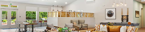 clubhouse with couches and chairs and a table