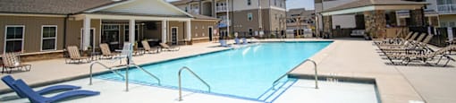 An image of Peachtree Village’s upscale apartments in Boiling Springs, SC. The resort-style pool is visible in the foreground.