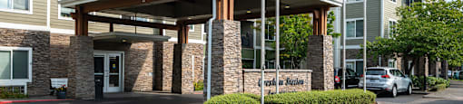 The entrance to a building with a sign that reads "Crest Station.".