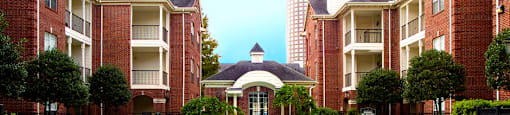 Luxury swimming pool with large sundeck at Tuscany Gate Apartments in Houston.