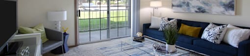 Apartments in central Lincoln Nebraska with spacious living room, spacious floor plan, spacious balcony at Tanglewood Apartments