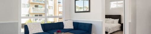 a living room with a couch and a coffee table