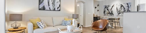 a living room with a couch and a table at Ascent Apartments, Cottonwood Heights Utah 