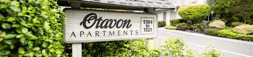 a monument sign in front of a building at OTAVON APARTMENTS, Novato, 94947