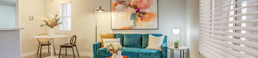 1-Bedroom Apartments in North Mountain Village Phoenix AZ - Ardella on 28th - Furnished Living Room with Vinyl Flooring and Windows