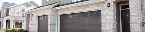 View of exterior unit and garage.