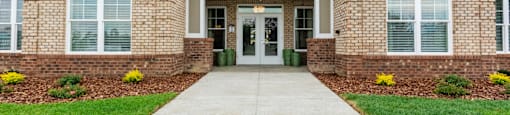 Outside of the Clubhouse with Two Front Doors.