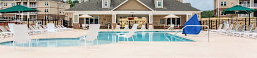 Building in the Background with Pool in Front of it.