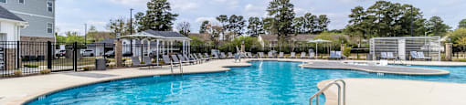 our apartments have a resort style pool with chairs