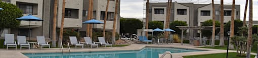 El Encanto pool view with plenty of lounging and relaxation space.