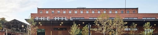 A building with the name "The Mill" on it.