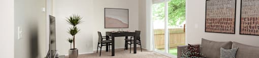 a living room with a couch and a table and a tv