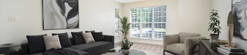 a living room with a couch and a table