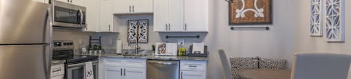 Kitchen with stainless steel appliances at Highland Hills Apartments, Grovetown Georgia