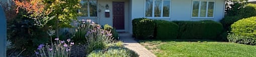 3440 Bruckner Circle, Mountain View, CA 94040 front of the home with a beautiful walkway and green lawn adorned with bushes and flowers