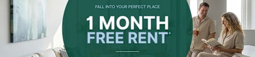 A man and woman are sitting in a living room, with a large circular graphic in the foreground advertising a 1 month free rent offer.