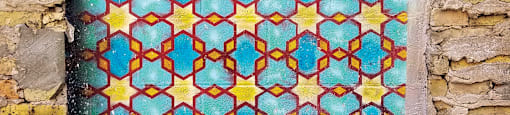 A door with a pattern of blue and yellow stars.