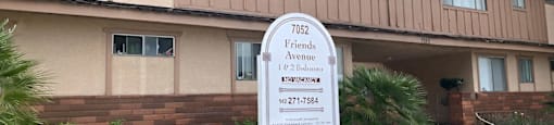 a building with a sign in front of it