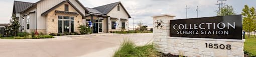 A building with a sign that says Collection Schertz Station 18508 in front of it.