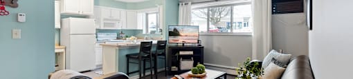 Spacious living area and kitchen at Abbott Pointe Apartments in East Lansing, MI near Michigan State University