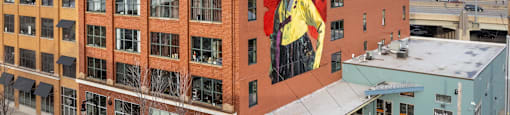 a mural of a woman on the side of a building